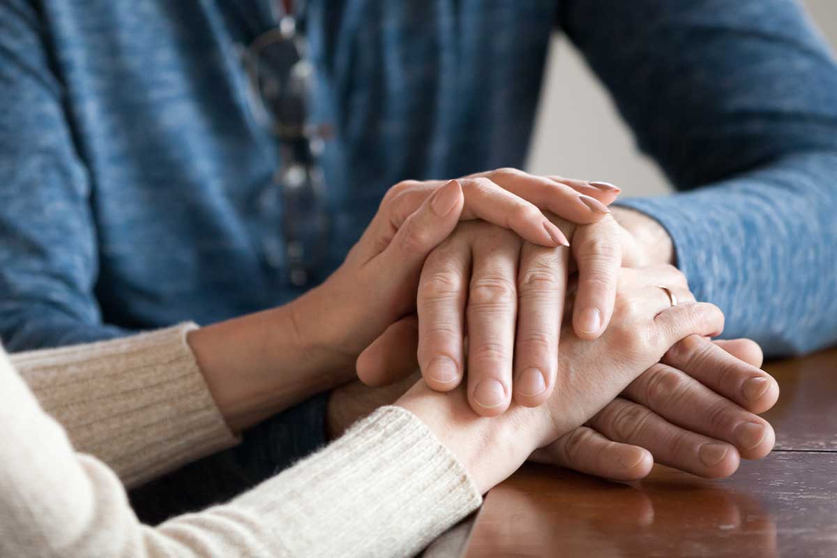 couple holding hands