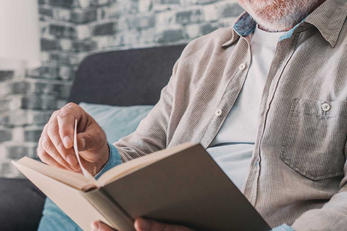 man reading book